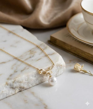 Niluk Gold-Plated Bow Design Pendant Necklace with Pearl Drop