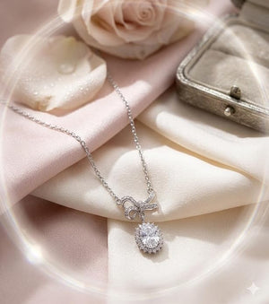 Niluk Gold-Plated Bow Pendant Necklace with Oval