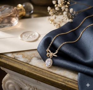 Niluk Gold-Plated Bow Pendant Necklace with Oval