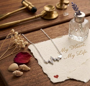 Niluk Gold-Plated Heartbeat Pendant Necklace